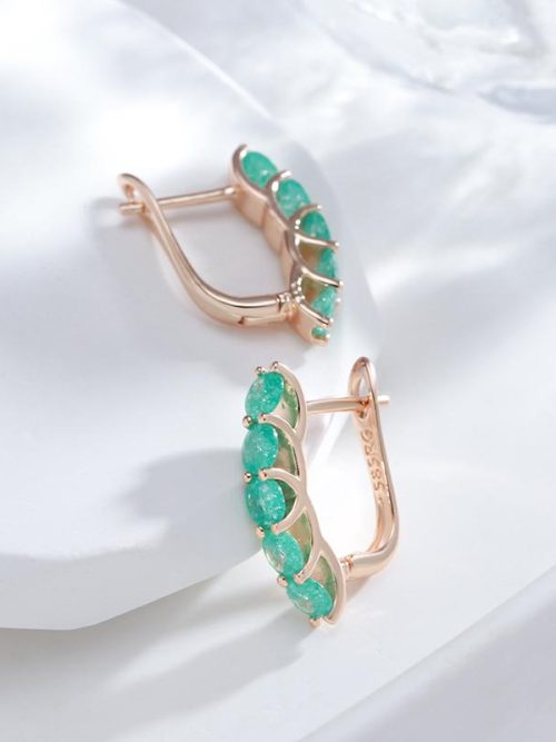 Evia Emerald Round Cut Stud Earrings