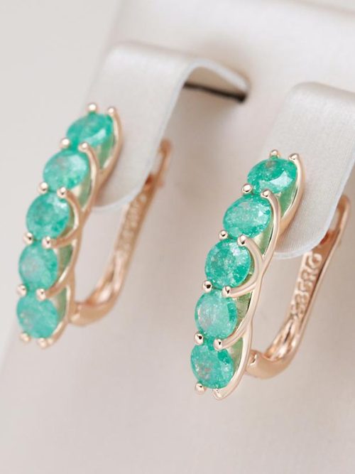 Evia Emerald Round Cut Stud Earrings